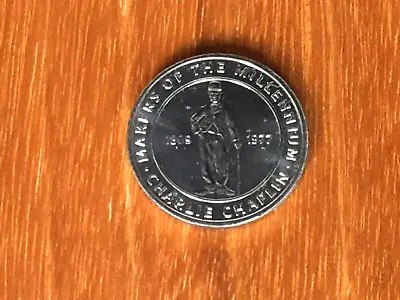 1 X MAKERS Of The MILLENNIUM COIN / MEDAL. CHARLIE CHAPLIN. ISSUED 2000. • £1