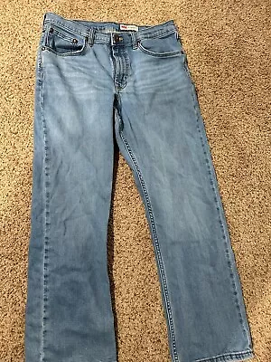 Wrangler Jeans Men's 32x30 Relaxed Bootcut Blue Stretch Denim Pants Light Wash • $15