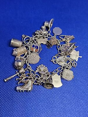 Vintage Sterling Silver Charm Bracelet With 26 Charms 60 Grams See Description  • £22