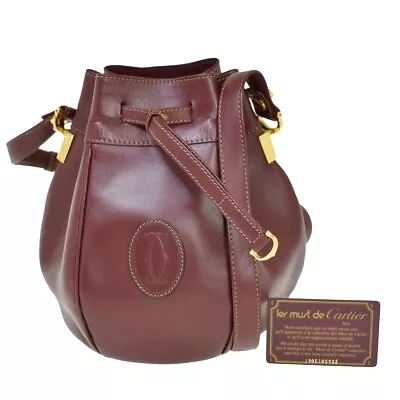 $288 • Buy MUST DE CARTIER 2C Drawstring Shoulder Bag Leather Bordeaux Gold Spain 62BX467