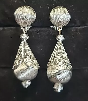 Vintage Signed Monet Silver Tone Bolero Filigree Dangle Clip-On Earrings • $25