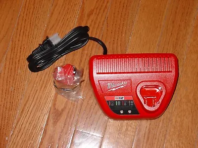 New Milwaukee M12 Red Lithium 12V Li-Ion 1.5 Battery And Charger 48-59-2401 • $30.45