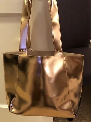 ISSEY MIYAKE Gold Metallic Tote Bag • $99