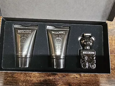 Moschino Gift Set -- .17 Oz Mini EDP + .8 Oz Shower Gel + .8 Oz After Shave B... • $21.99