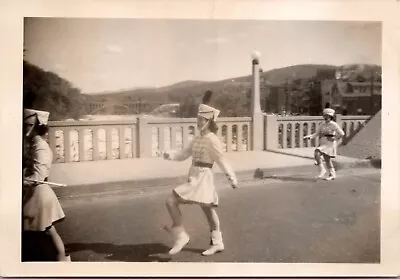 Vintage Photo Majorettes Marching Across Bridge During A Parade Batons Uniforms  • $13.95