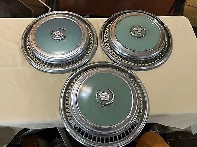 Vintage Cadillac Hubcaps • $0.99