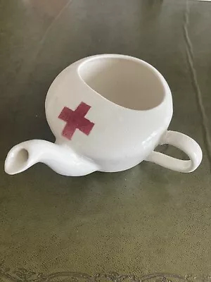 Invalid Feeder Cup • £2