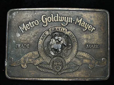 PE13127 VINTAGE 1970s **METRO-GOLDWYN-MAYER** MGM STUDIOS COMMEMORATIVE BUCKLE • $35