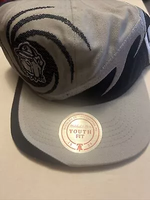 Mitchell & Ness Gray/Navy Georgetown Hoyas Sharktooth Snapback Youth Hat • $19.99