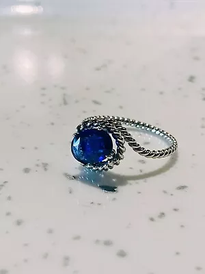 Intense Blue Natural Ceylon Sapphire On A Twisted Platinum Ring  • £425