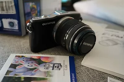 Olympus E-PM1 With 14-42mm F/4.5-5.6 • $299