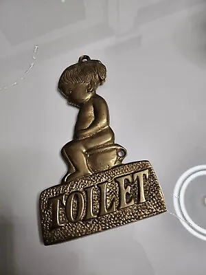 Toilet Sign Brass Girl Sitting Peeing. • $10