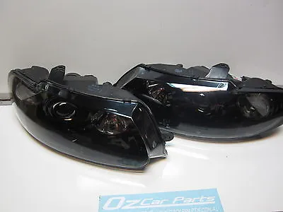 Holden VT Monaro Commodore Black Altezza Headlight Pair NEW LEFT AND RIGHT SIDE • $349