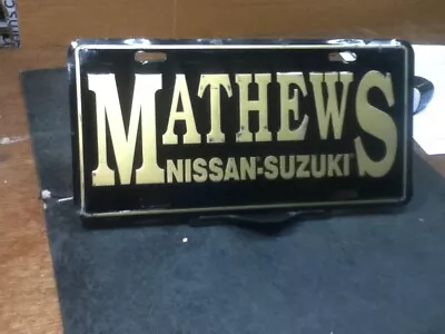 Dealership License Plate Mathews Nissan Suzuki Clarksville TN Vintage Metal • $19.25