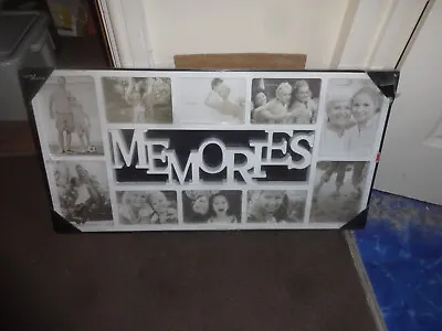 Memories Multi Aperture Photo Frame With A Heart-Warming 'Memories' Slogan • £13