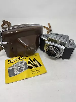 Vintage Minolta A -2 35mm Film Camera With Rokkor  Lens Leather Case Manual • $100