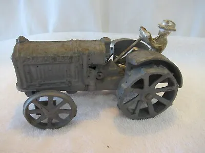 VINTAGE 1/16 MCCORMICK DEERING TRACTOR W/ MAN CAST IRON - Wheels Are Good • $19.95