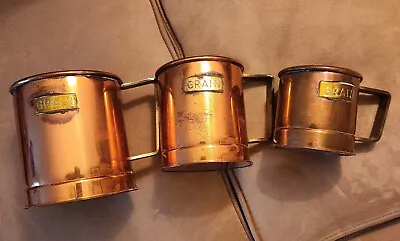 Set Of 3 Vintage Copper Reproductions Antique Measuring Cups Brass  Grain Labels • $12