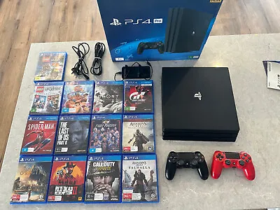 $250 • Buy Sony PlayStation 4 Pro 1TB - Boxed With 14 Games, 2 Controllers And Dual Charger