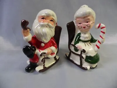 VINTAGE CERAMIC ROCKING SANTA W/PIPE & MRS CLAUS W/ CANDY CANE SALT & PEPPER! • $24