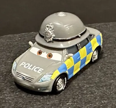 Mark Wheelsen UK Police Car - Cars 2 - Disney Pixar - 2013 • $6