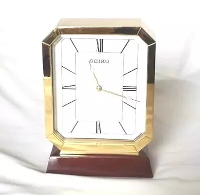 Seiko Mantel Clock. Brass With Mahogany Base.  • $21.95