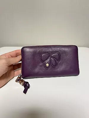 MARC JACOBS Pebbled Leather Purple Zip Around Wallet  • $40