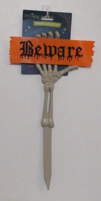 £5 • Buy Halloween Beware Skeleton Hand Garden Stake 