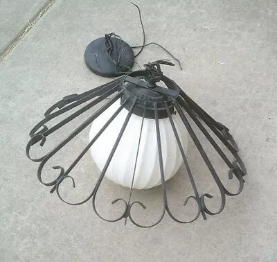 Vintage Black Wrought Iron Spanish Revival Hanging Swag Lamp / White Glass Globe • $75