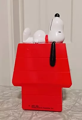 Vintage Plastic Coin Bank Peanuts Snoopy Laying On Dog House With Stopper • $9