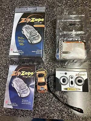 Vintage Radio Shack Zip Zaps 03A03 1/64 Micro RC Car Nissan 350Z Gently Used • $19