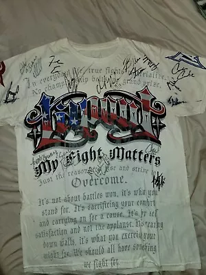 Signed UFC TAPOUT T-shirt. Fighters Included In Description (Size Large) • $3875