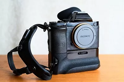 Sony ILCE-7R  Bundle W/5 Batteries Dual Battery Charger 28-70mm Lens & Grip • $225