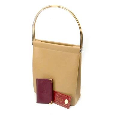 $450 • Buy Cartier Trinity Leather Hand Bag S6665.30