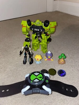 £15 • Buy Pokemon Transformers Ben 10 Bundle Uxie Bonsly Drifblim Ratchet Prowl Omnitrix