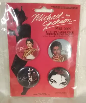 4 Michael Jackson Buttons Pins On A Sealed Card • $10