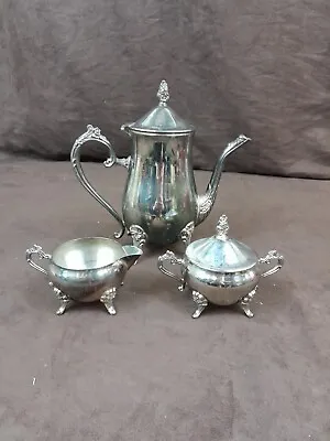 Silver Coloured Metal Tea Set Teapot Sugar Bowl Milk Jug Footed Floral Detail • £9