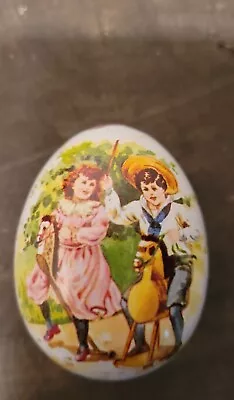 Vintage Ian Logan Design Swiss Made Tin Easter Egg 2.25  Children On Toy Ponies • $13.97