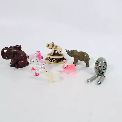 Lot Of 7 Miniature Elephant Figurines Ceramic Brass Plastic • $19.76