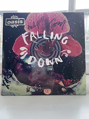 SIGNED OASIS 7” SINGLE FALLING DOWN/Noel & Liam Gallagher • £25