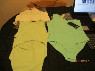 £10 • Buy 2 Ladies Body Suits One Halter Neck Top