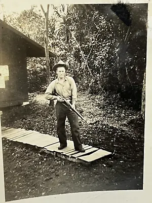 Old Vintage Photo Man Standing On A Wooden Walk Holding Gun Hunting Hunter • $14.95