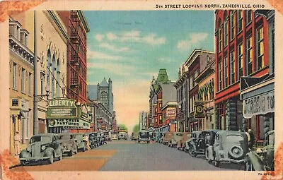 Zanesville OH Ohio 5th Street View Old Cars Shops Coca Cola Sign VTG Postcard • $7.99