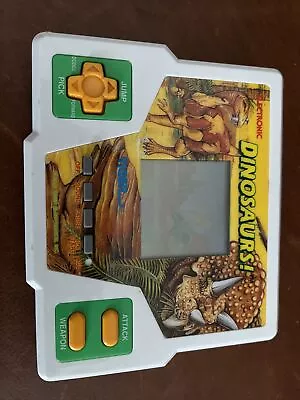 Tiger Electronic Handheld LCD Game  Dinosaurs • £34.99