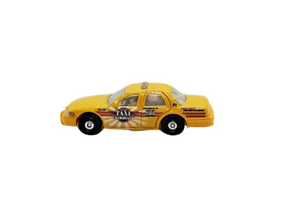 2021 Matchbox 2006 Ford Crown Victoria Taxi #3 Yellow - MOVING PARTS - Loose • $7.60