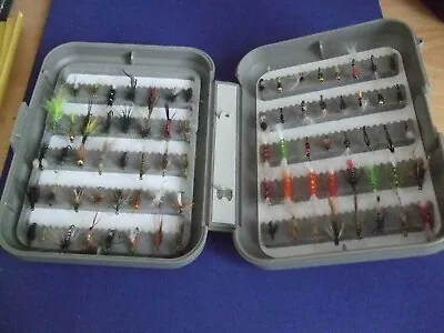 C & F DESIGN FLYBOX OF ASSORTED TROUT FLIES. SOME UNUSED..(No.569A) • $27.13