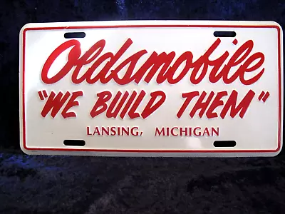 Vintage Original OLDSMOBILE  We Build Them  Lansing MI Embossed License Plate • $38.50