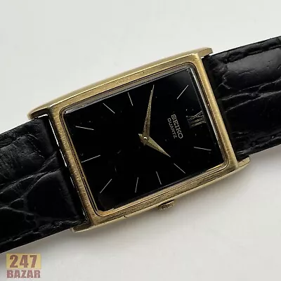 Vintage Seiko Tank Black Dial Gold Tone Quartz Men's Dress Watch • $74