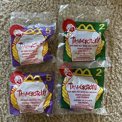 1997 McDONALD'S TAMAGOTCHI #2 & 5 HAPPY MEAL KEY RING TOYS NIP LOT OF 4 • $23.99