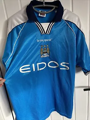 Retro Manchester City Eidos Shirt • £120